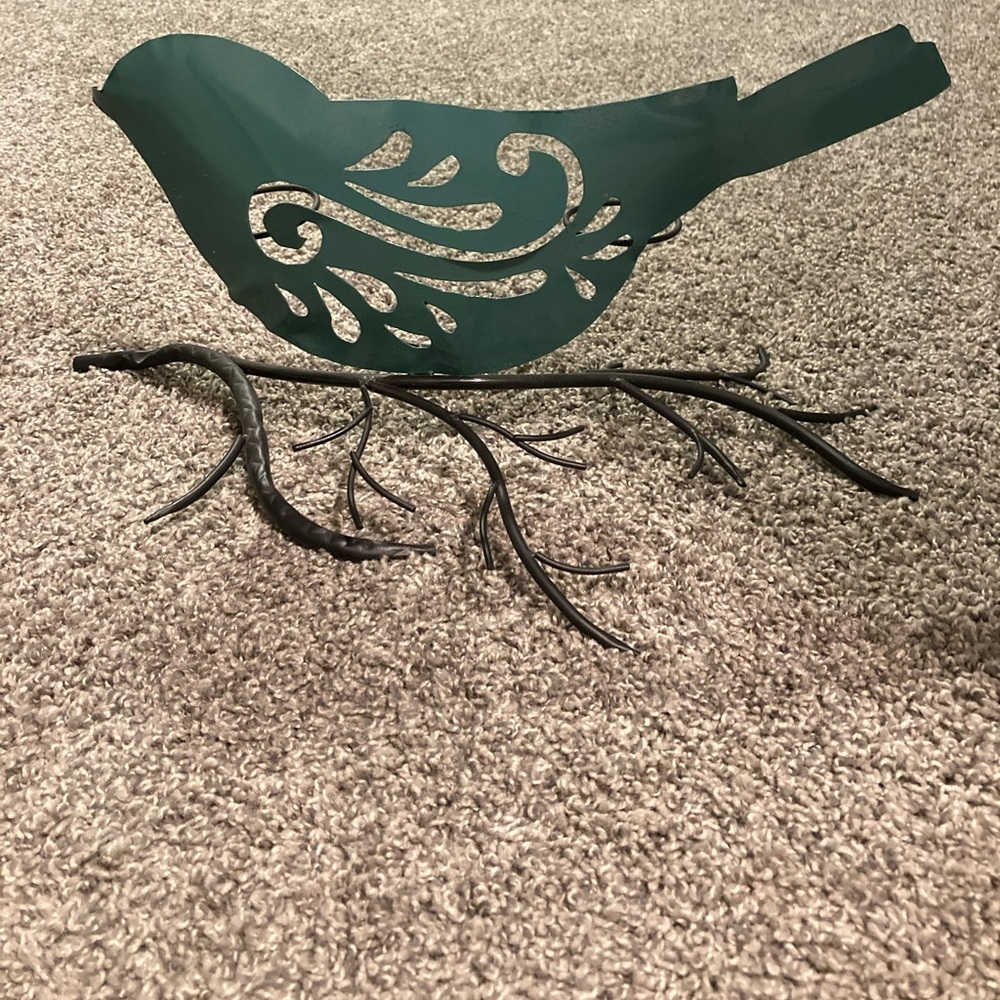 Metal Teal bird candle holder holds 3 candles about 15 inches long